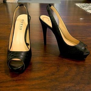 Never worn GUESS pumps. Size 7